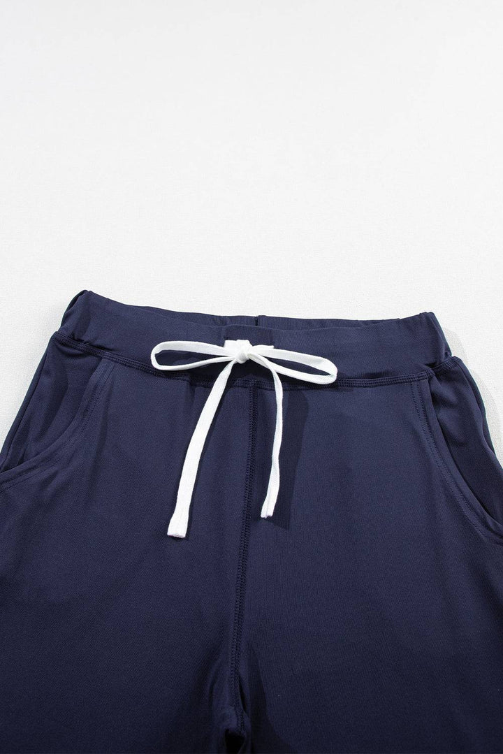 a close up of a pair of blue shorts