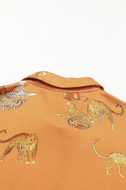 a close up of a shirt with animals on it