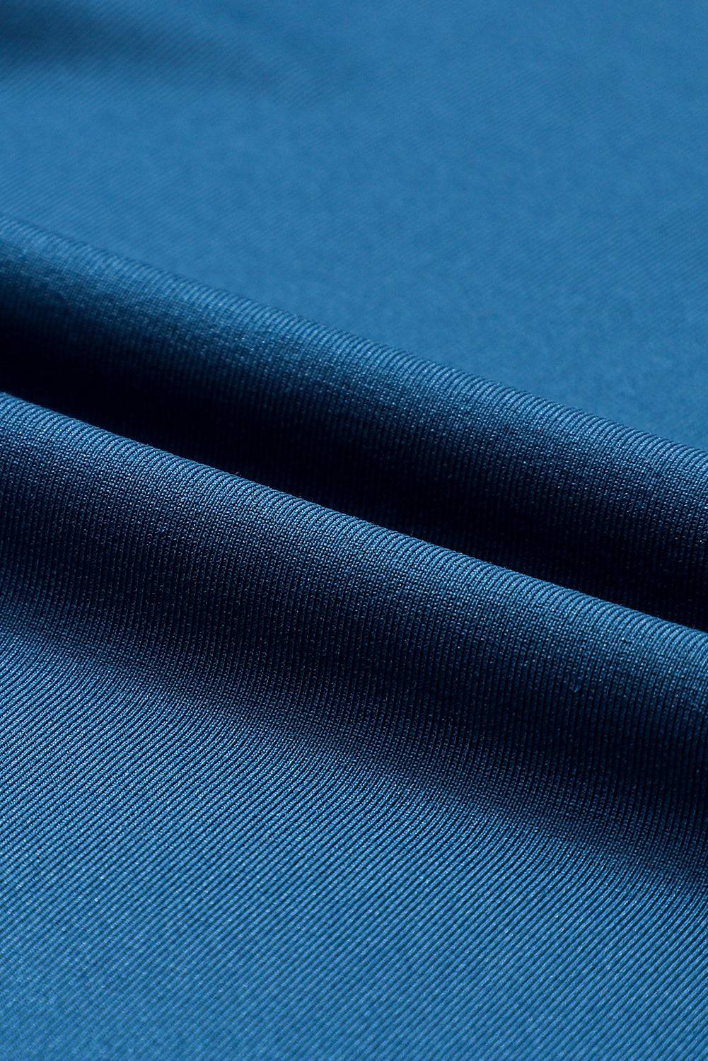 a close up view of a blue fabric