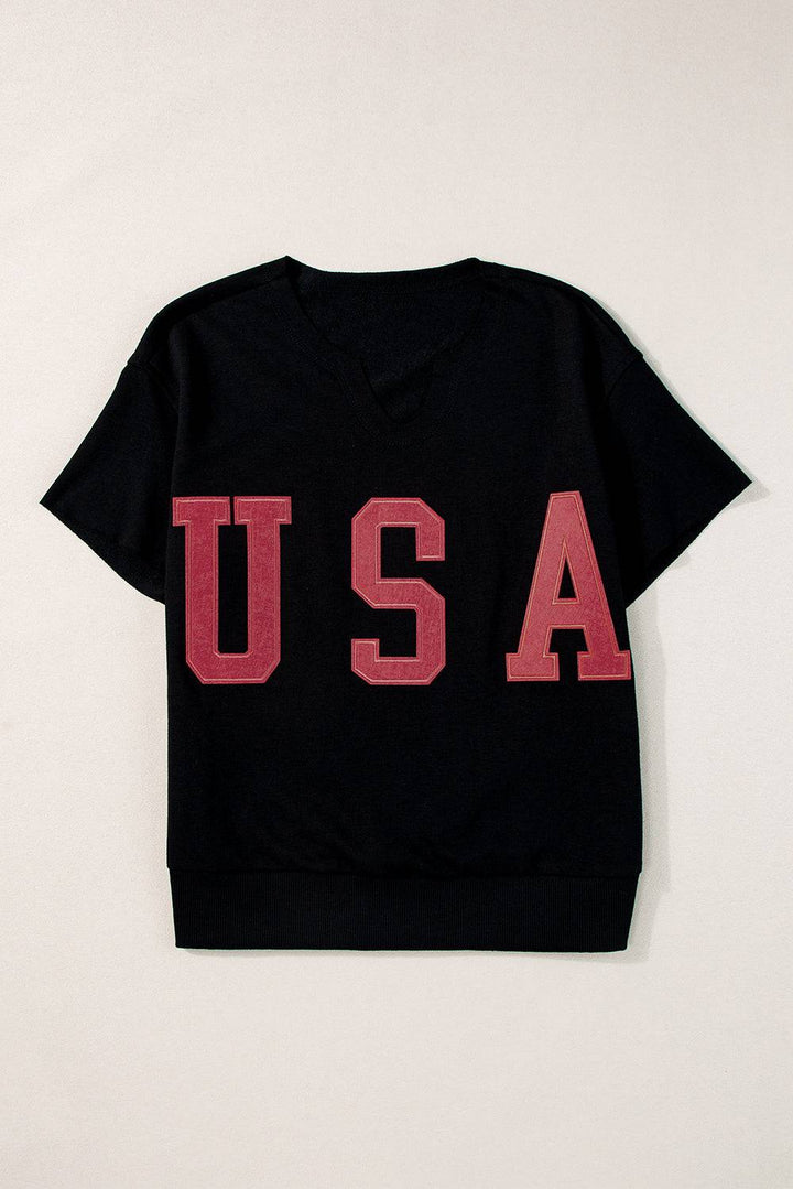 a black shirt with the word usa printed on it