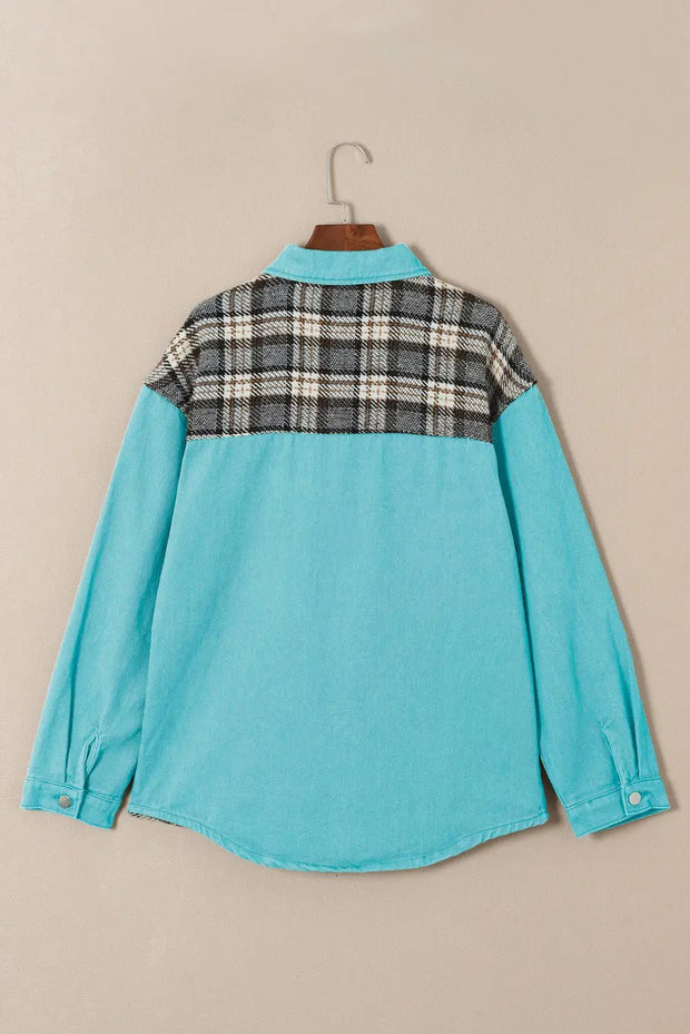 a blue shirt with a check pattern on the back