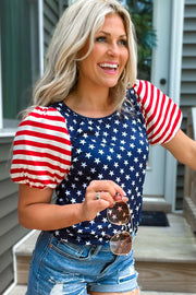 a woman in a patriotic shirt and ripped shorts