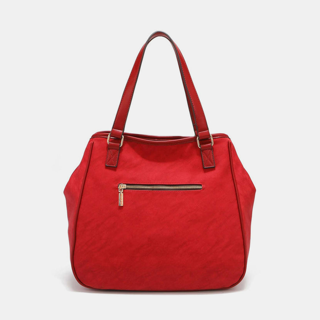 a red handbag with a zipper on it
