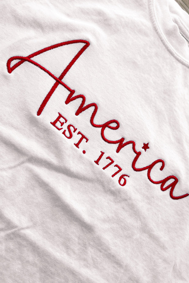 a white shirt with the word america on it