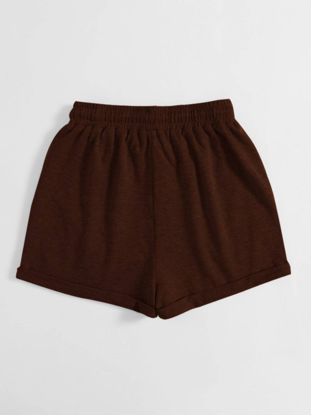 a pair of brown shorts on a white background