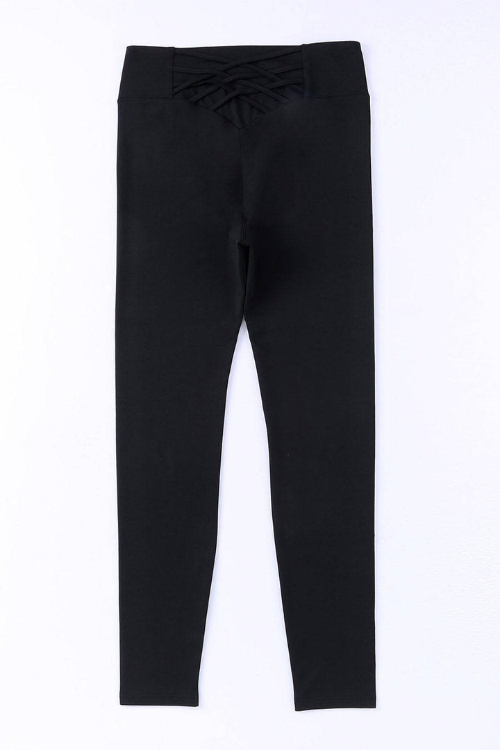 a pair of black pants on a white background