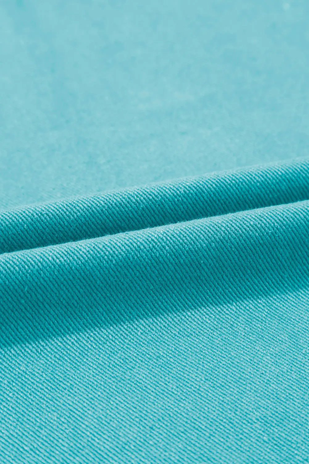 a close up view of a blue fabric