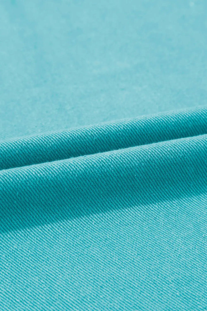 a close up view of a blue fabric