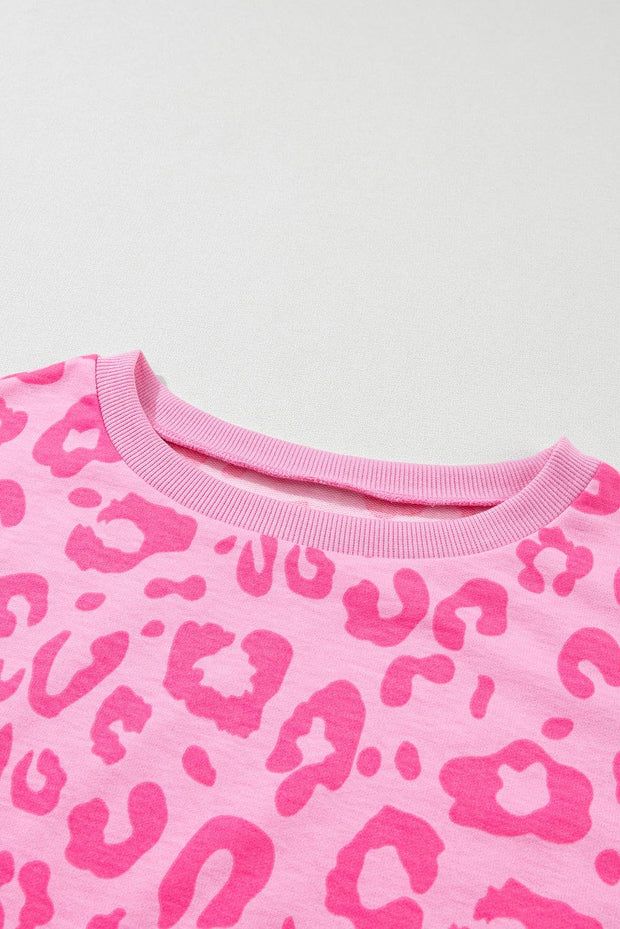 a pink and black leopard print t - shirt