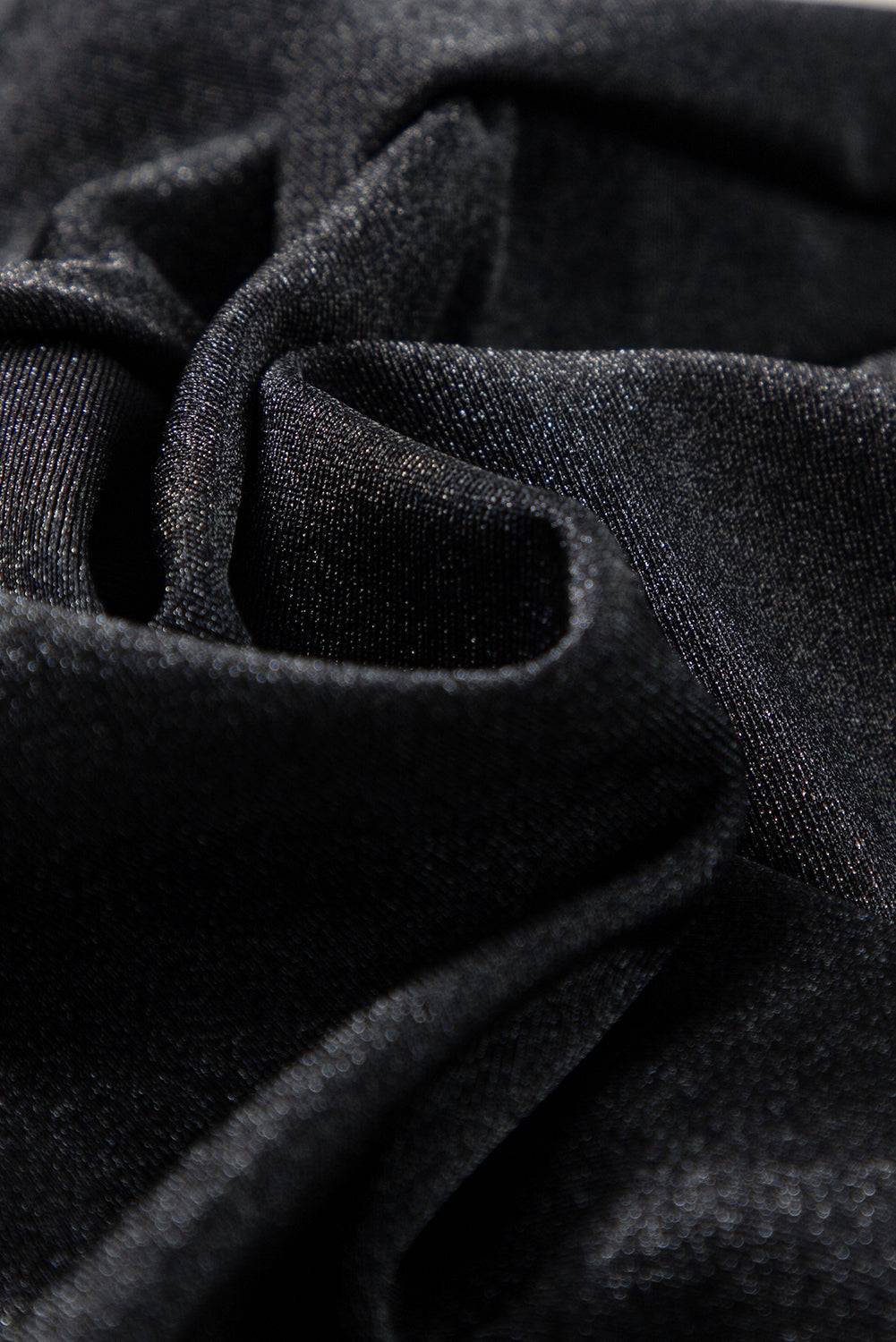 a close up view of a black fabric