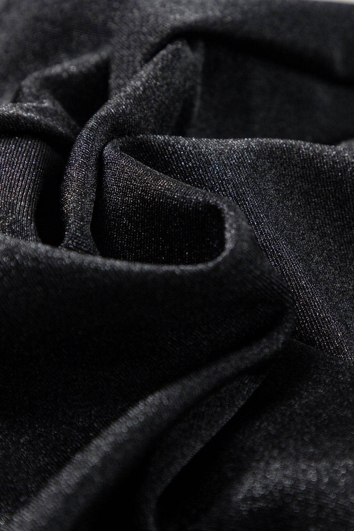 a close up view of a black fabric