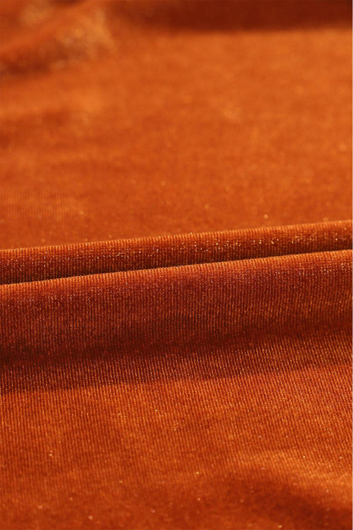 a close up of an orange colored fabric