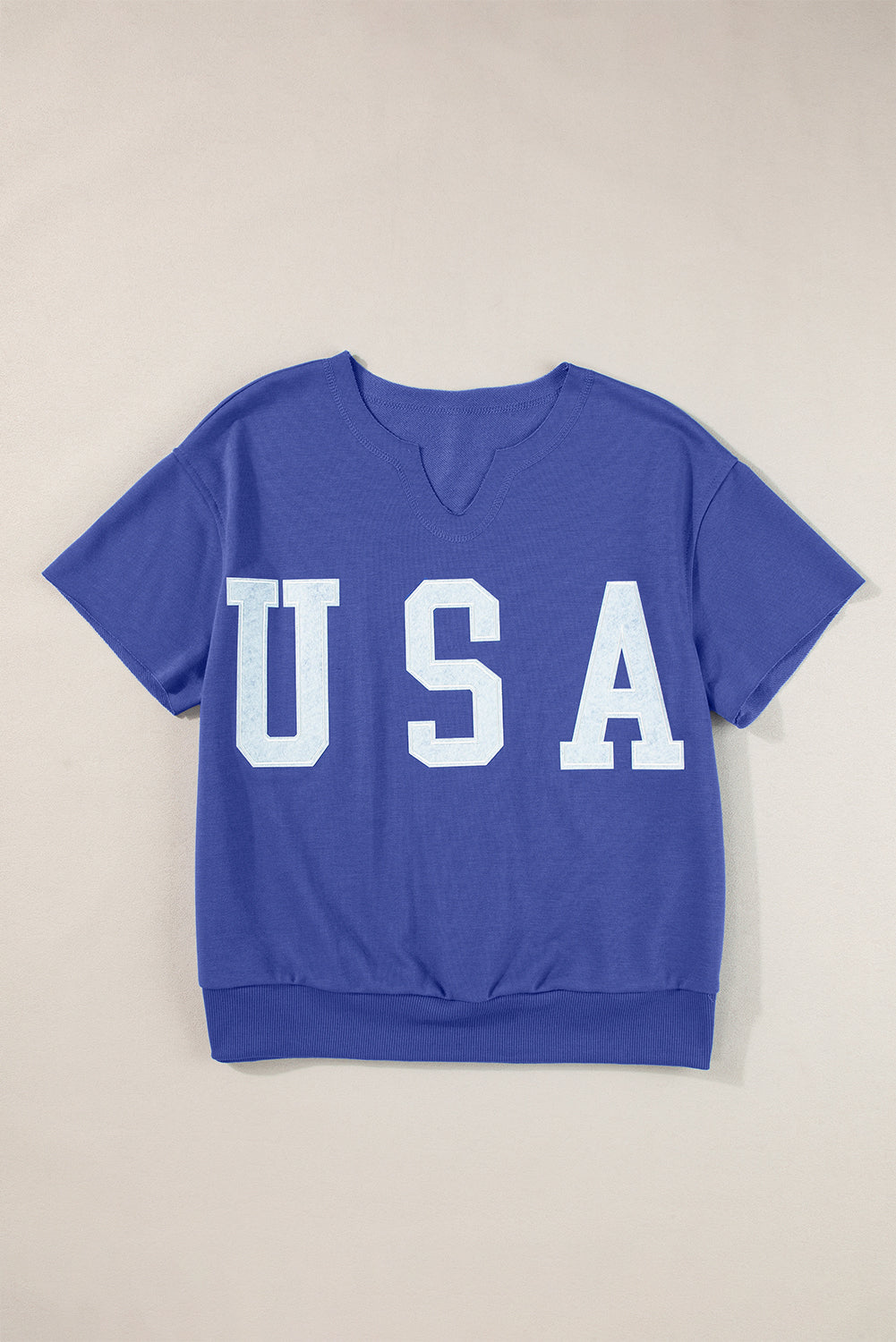 a t - shirt with the word usa printed on it