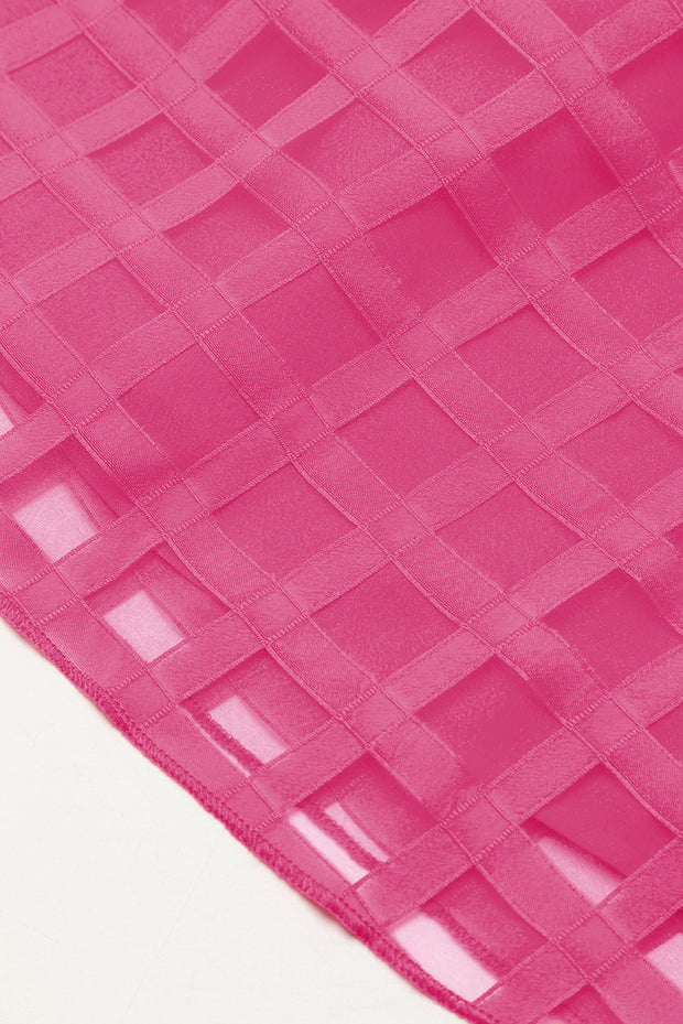 a close up of a piece of pink fabric