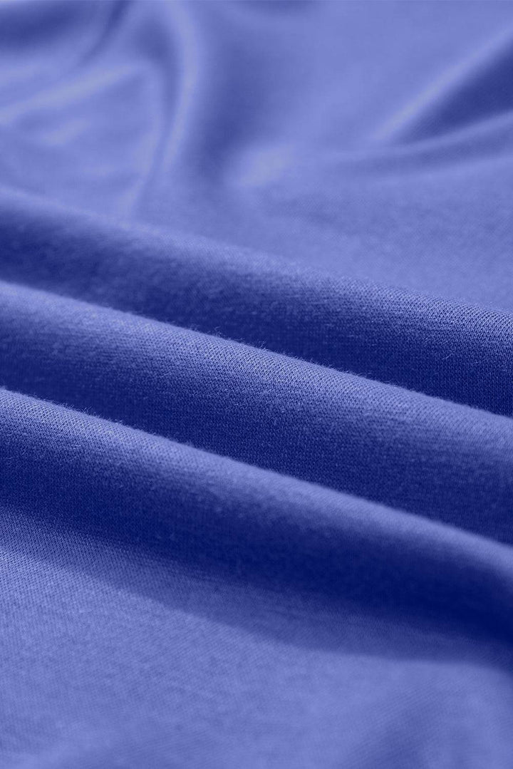 a close up of a plain blue fabric