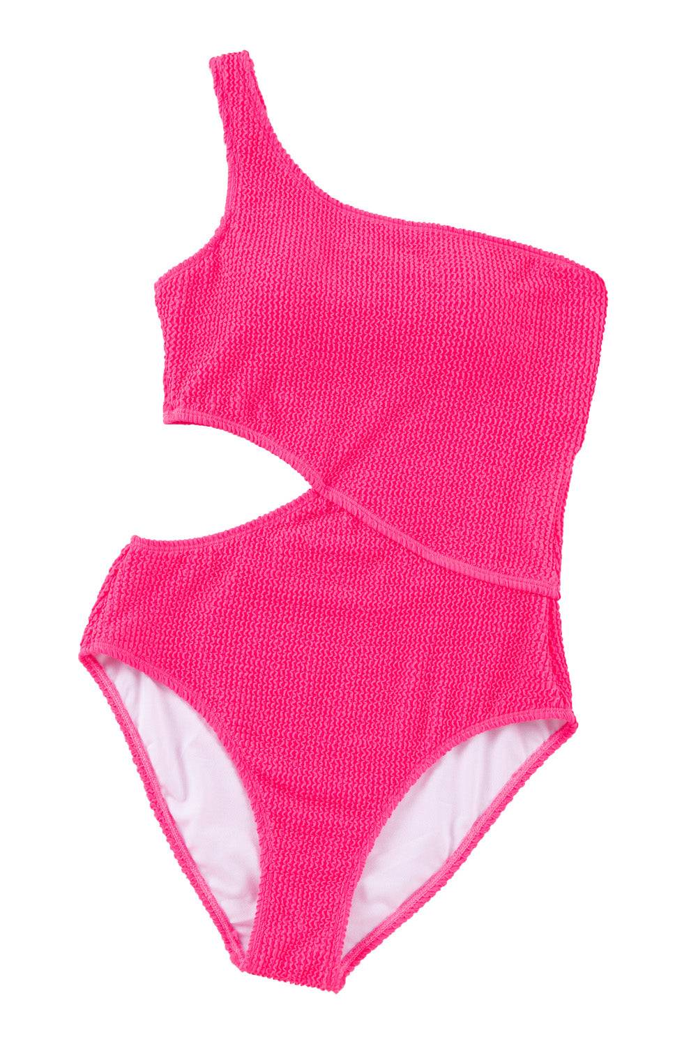 a pink one piece swimsuit on a white background