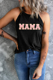a woman wearing a black tank top with the word mama on it