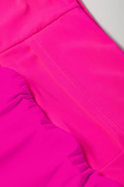 a close up of a bright pink skirt