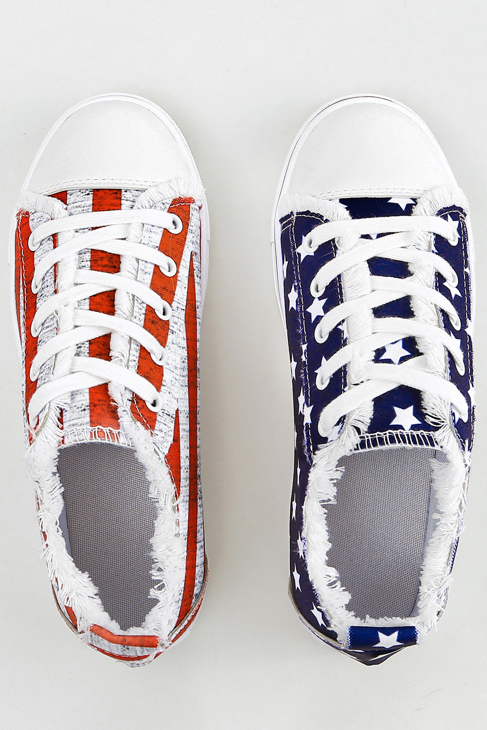 a pair of red, white and blue sneakers