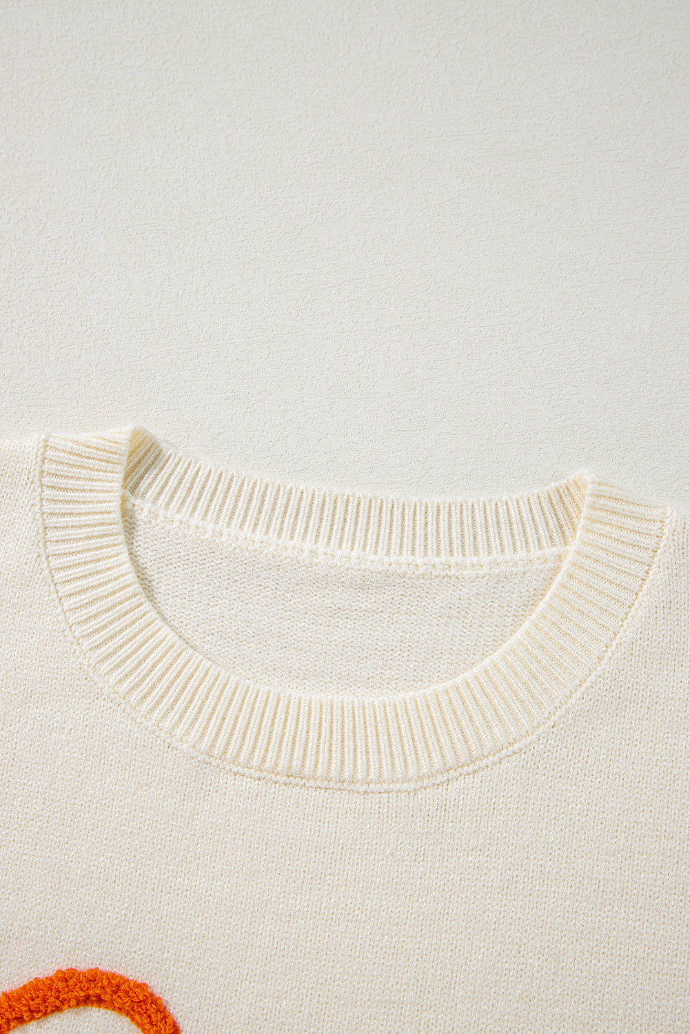 Boo Knitted Pattern Ribbed Edge Drop Shoulder Sweater