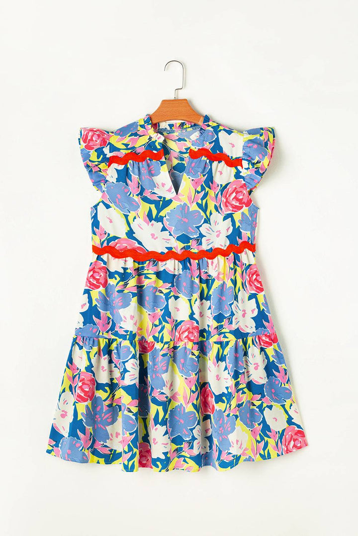 Flat lay of Pink Floral Printed V Notched Ric Rac Flutter Sleeve Dress on hanger. A-line silhouette with vibrant floral print at Faith & Co. Boutique.