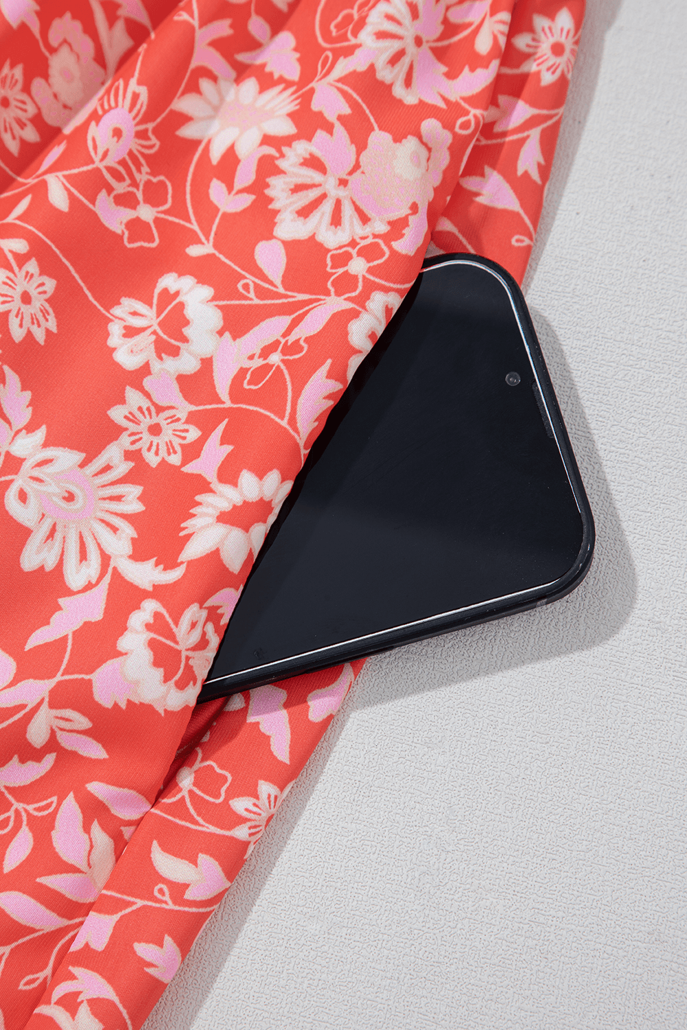 hidden pocket detail on Red Floral Print Tasseled Tied Sleeve Empire Waist Maxi Dress, blending practicality with style