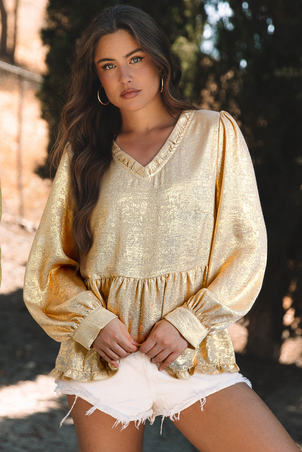 Gold Metallic Frilled V Neck Puff Sleeve Babydoll Blouse styled for autumn, available at Faith & Co. Boutique with a flattering babydoll silhouette.