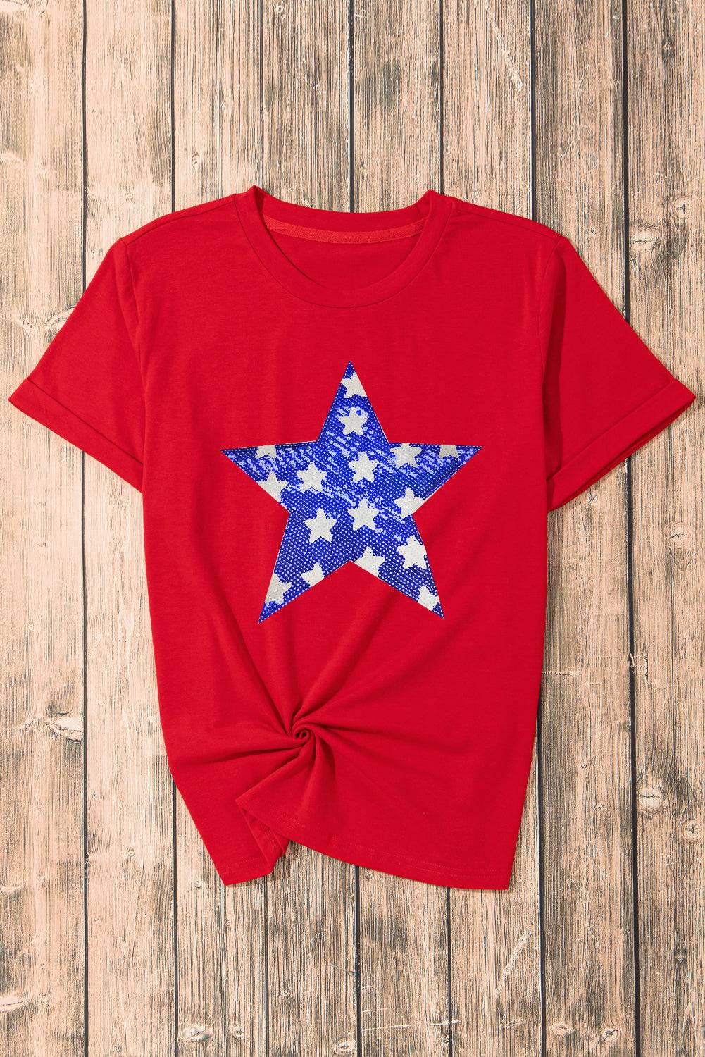a red shirt with a blue and white star on it