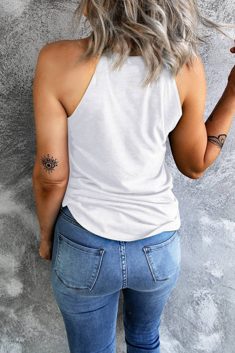 a woman with a tattoo on her left arm