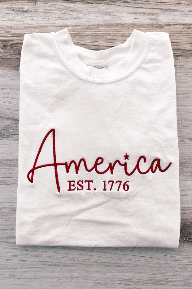a white t - shirt with the word america on it