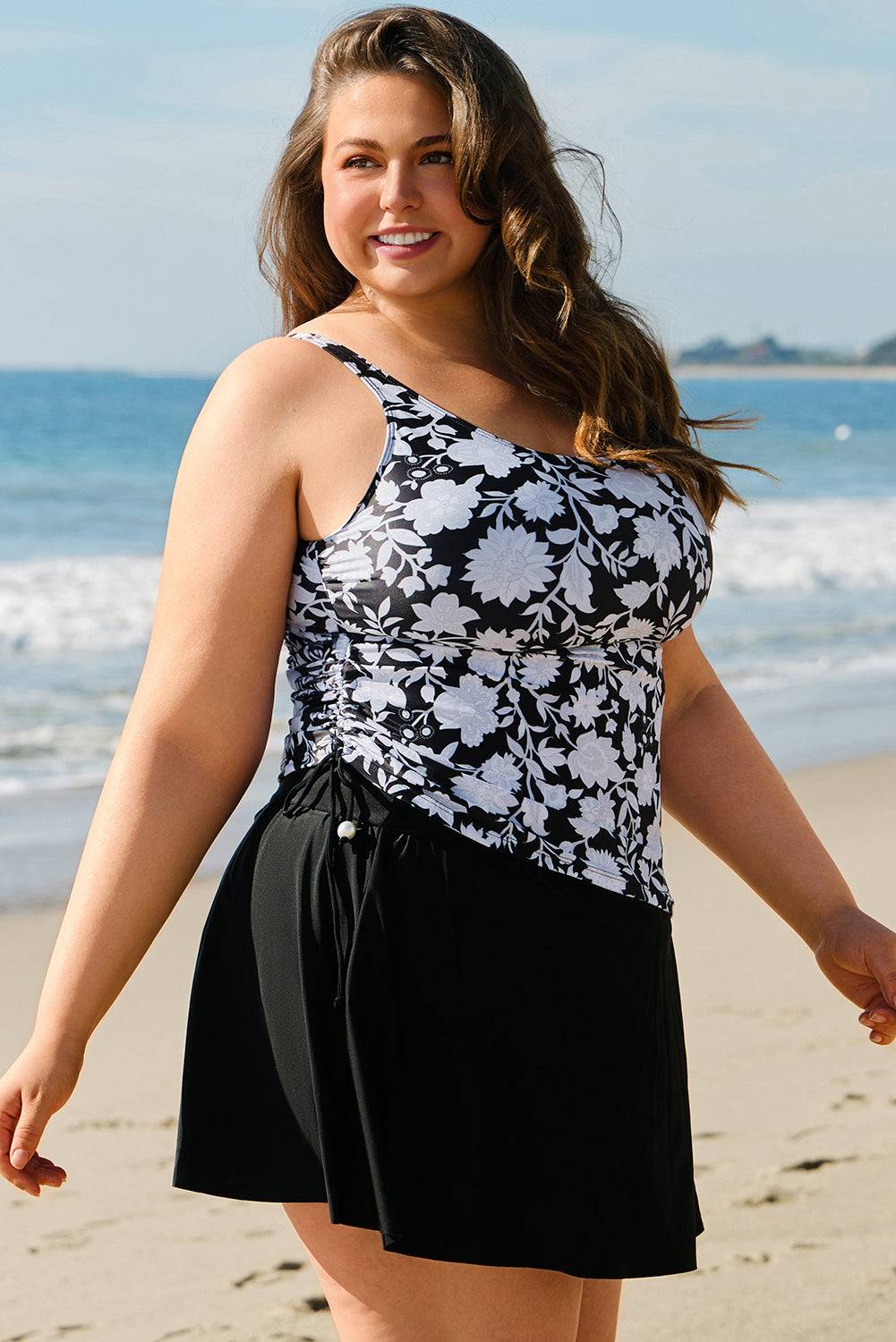 Side view of Black Plus Size Printed Square Neck Drawstring Ruffled Tankini Set featuring ruched sides and boho style. Shop now at Faith & Co. Boutique.
