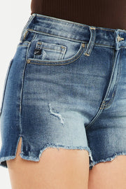 a close up of a woman's shorts with holes