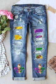 a pair of jeans with colorful patches on them