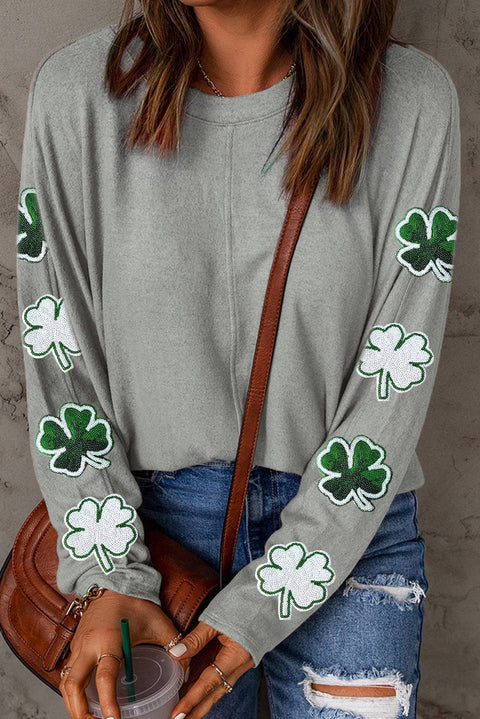 a woman wearing a st patrick's day sweater