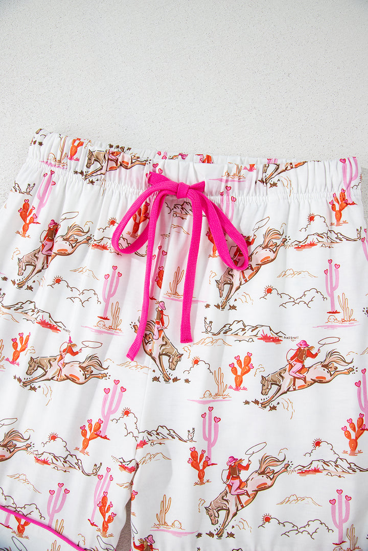 Close-up of button and collar detail on White Cowgirl Country Print Pajamas Set with pink piping. Shop White Cowgirl Country Print Pajamas Set at Faith & Co. Boutique.