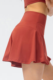 a close up of a woman's butt wearing a red skirt