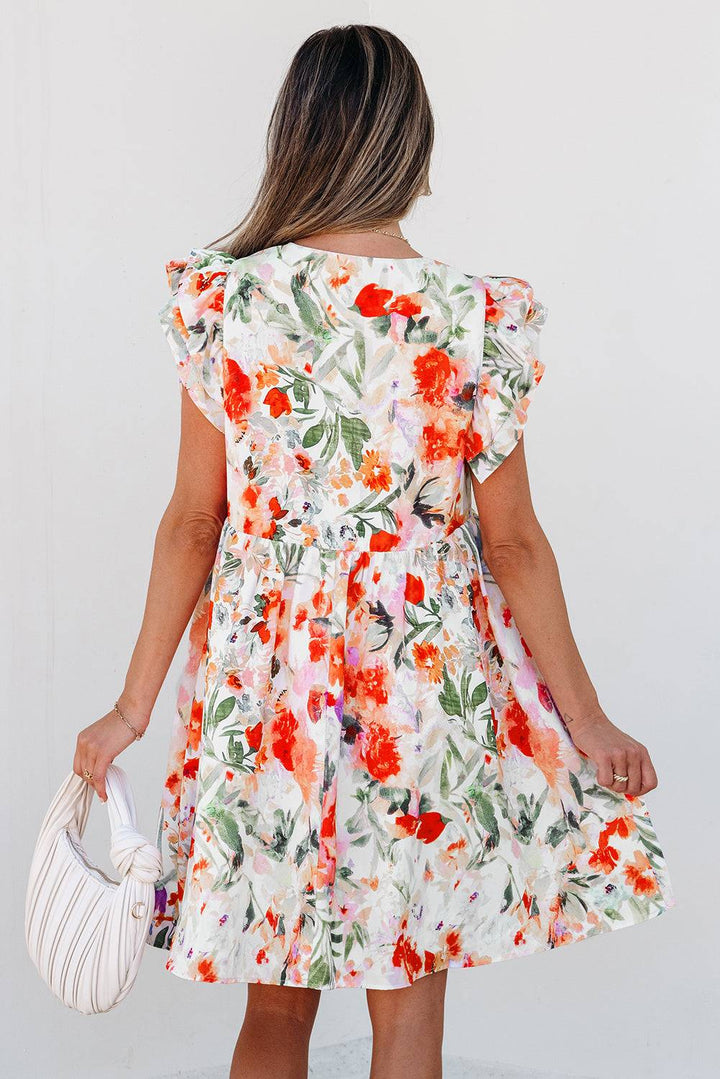 Back view of Pink Floral Double Ruffle Sleeve V Neck High Waist Mini Dress with soft ruffle sleeves and flowy summer fit, ideal for weddings or vacations.