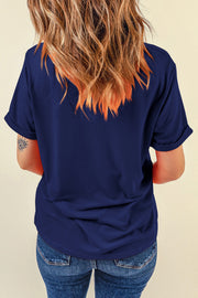 the back of a woman's blue shirt