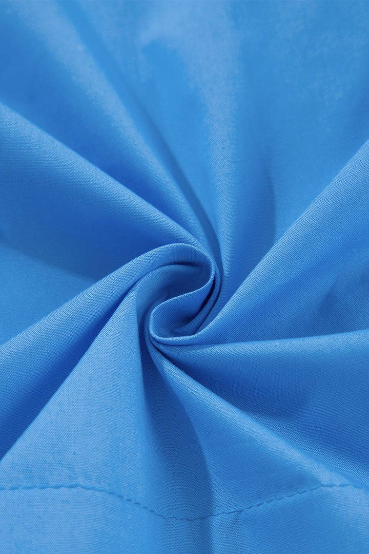 a close up view of a blue fabric