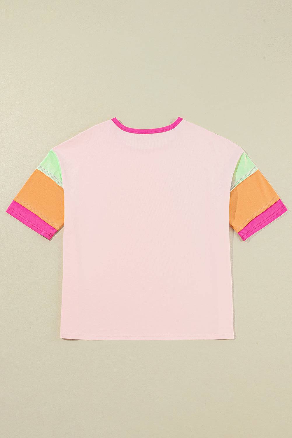 a pink t - shirt with multi - colored sleeves