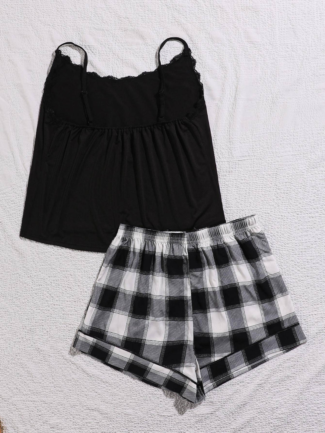 two pieces of black and white checkered shorts