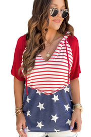 a woman wearing a red, white and blue shirt with stars on it