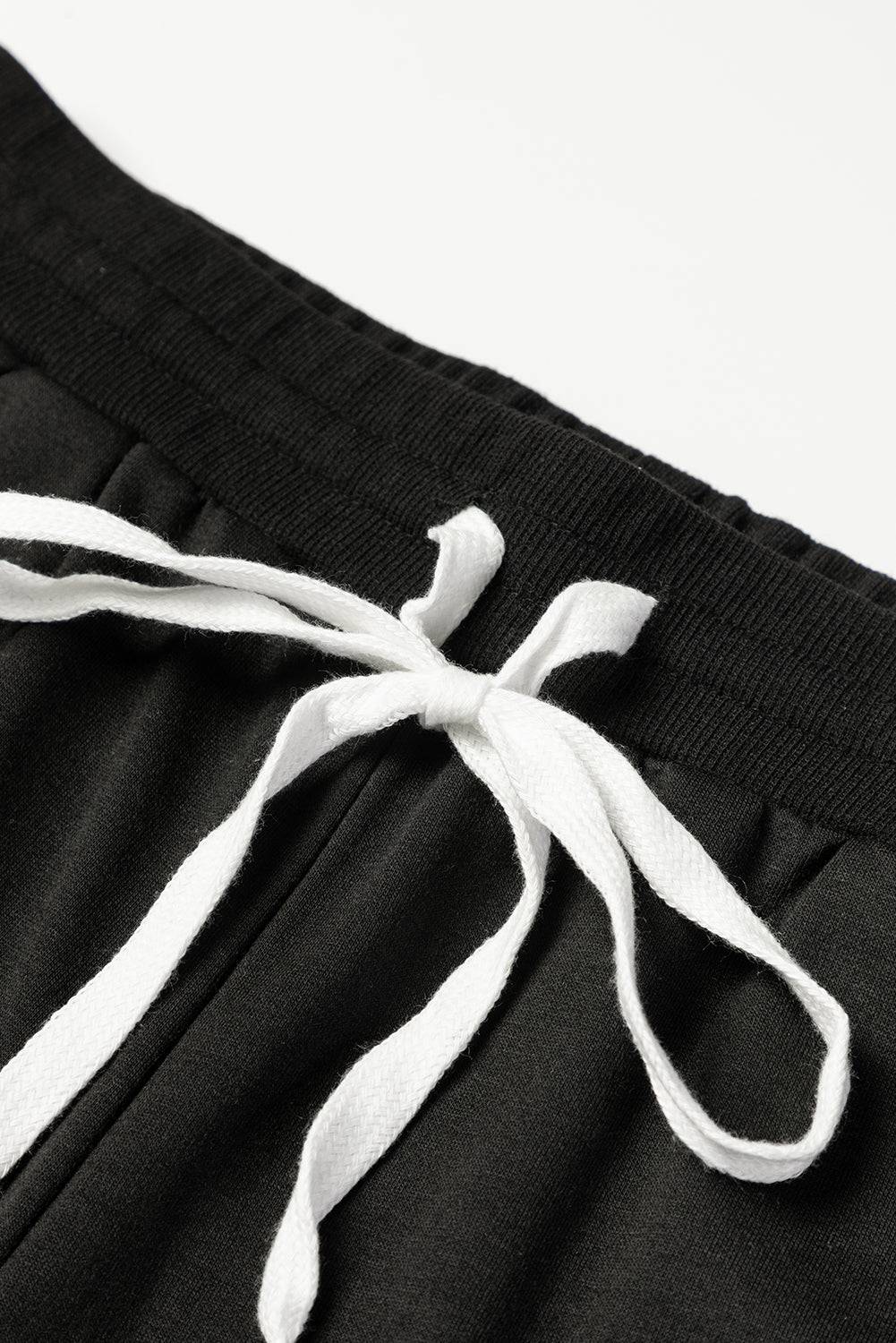 a close up of a pair of black and white pants