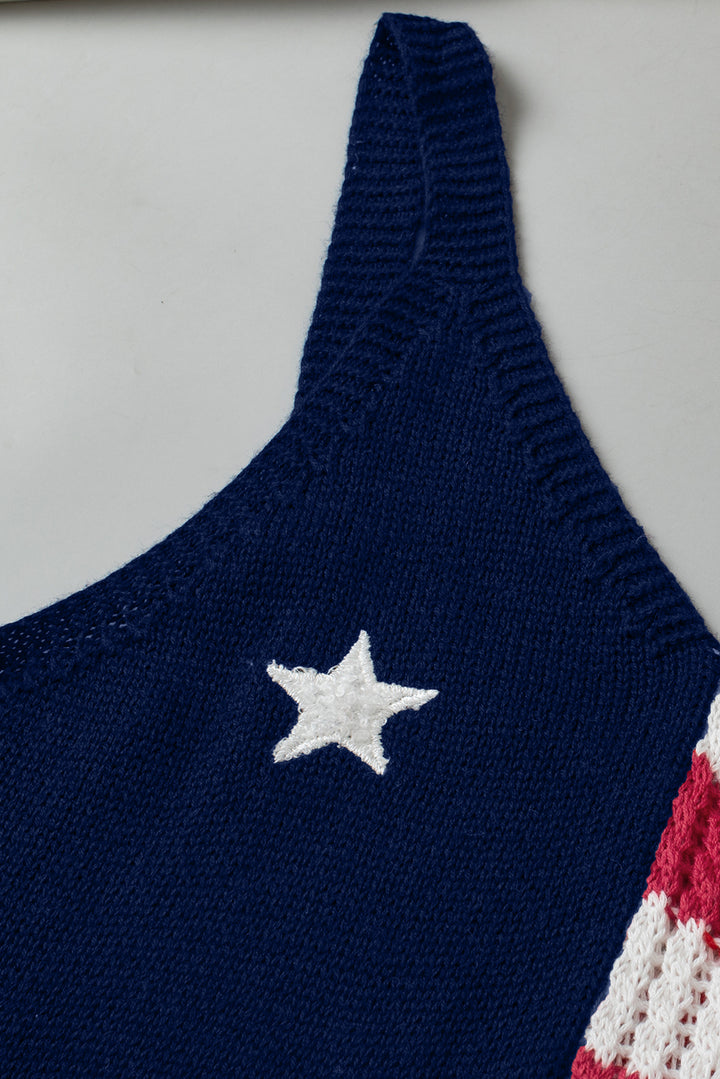 a blue sweater with a white star on it