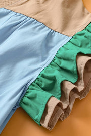 a close up of a blue and green skirt