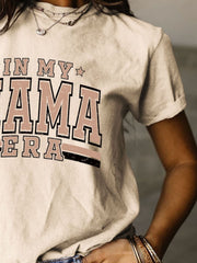 a woman wearing a shirt that says in my mama sierra