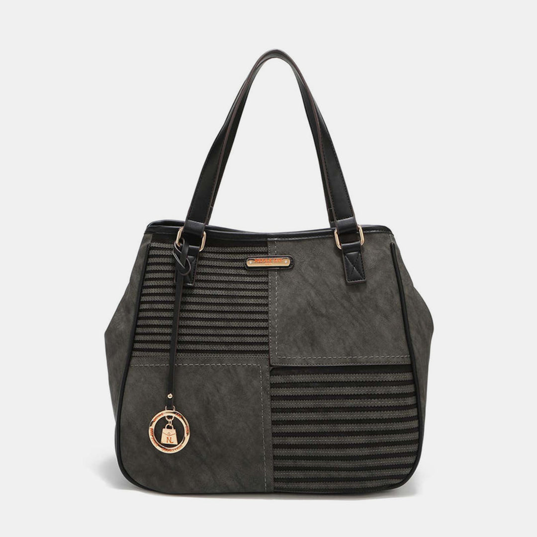 a black handbag with a striped design