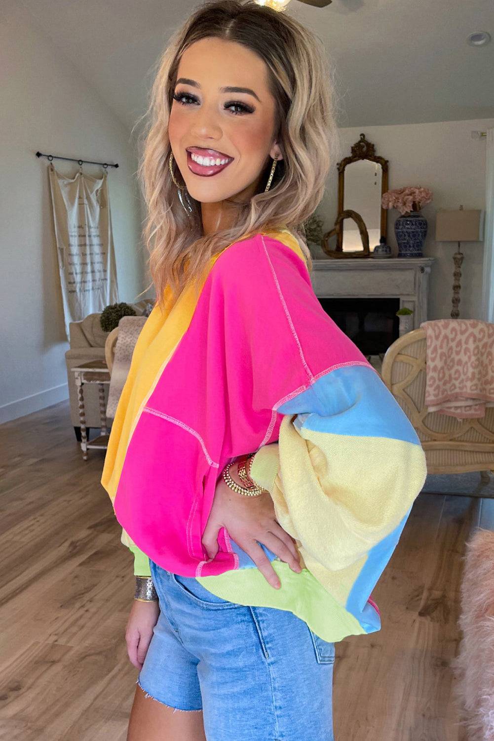 a woman posing for a picture in a room