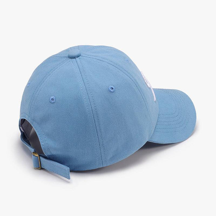 a blue hat with a white tag on it