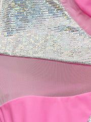 a close up of a pink dress with sequins
